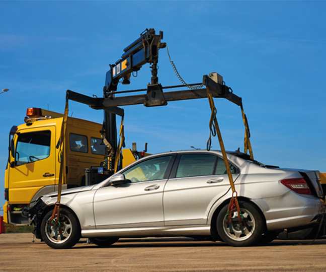 Towing truck towing a car