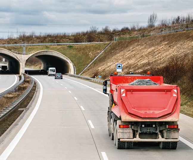 A tipper truck driving on the motorway